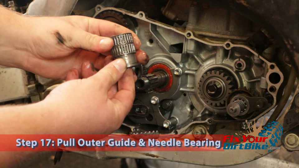 Step 17: Pull the clutch outer guide and needle bearing.  The needle bearing is fragile so keep the two parts together.