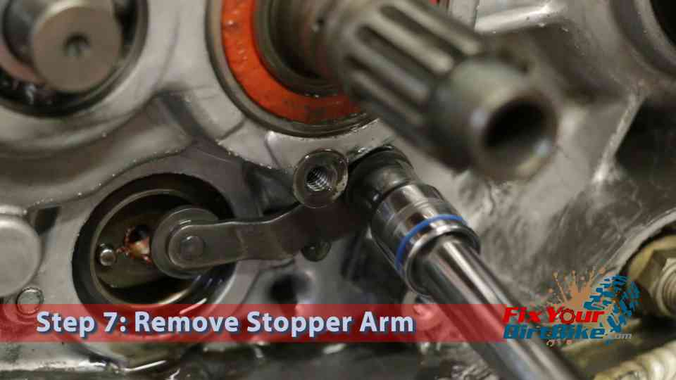 Step 7: Remove the stopper arm.