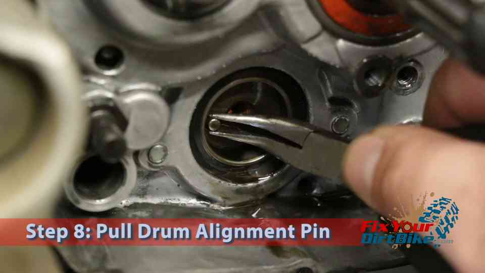 Step 8: Pull the shifter drum alignment pin.