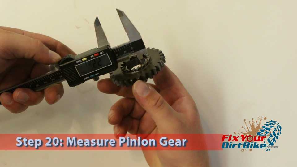 Step 20: Measure pinion gear bore. Service Limit: 20.05mm
