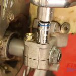 Step 10 – Tighten the pinch bolts on the axle nut side first.