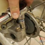 Step 13 – Torque the pinch bolts on the opposite side the axle nut.