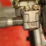 Step 6 – Pull up on the wheel to relieve the pressure on the axle.