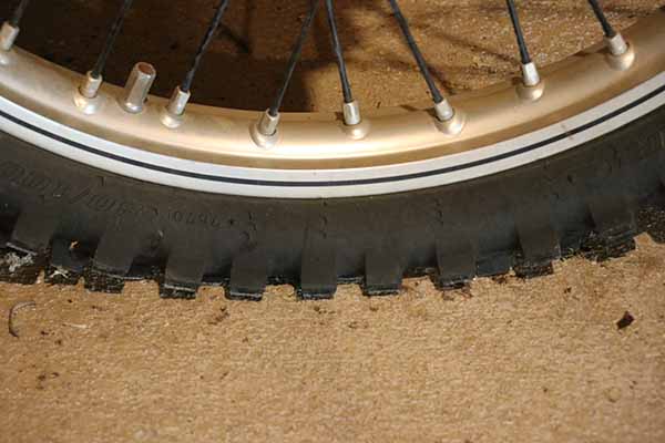 Deflated dirt bike tire