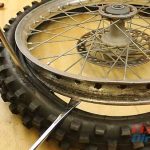 Step 12 – Pry Rim Up Out Of The Tire