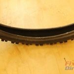 Step 17 – Stand Tire Up And Push Down