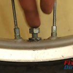 Step 2 – Loosen The Rim Lock Nut