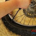 Step 25 – Slip Tire Over Rim Lock