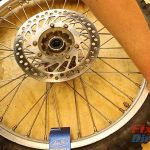 Step 30.1 – Push Down On Opposite Side Of Tire