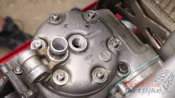 Place your cylinder head, and install the mounting nuts finger tight.
