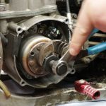 11 – Install Puller And Remove Flywheel