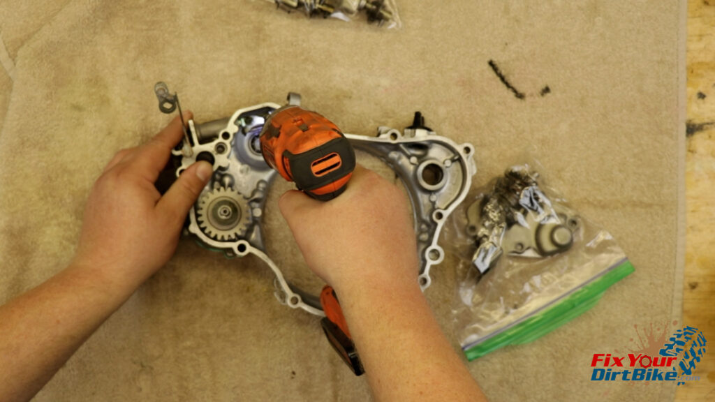 2 - Start by removing the two screws holding the governor fork to the push rod assembly