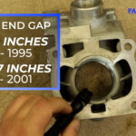 7 – Insert the piston ring in the bottom of the cylinder and push it down with the piston so it inserts evenly.